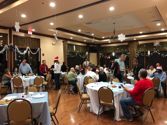 residents celebrating the winter season at a holiday party