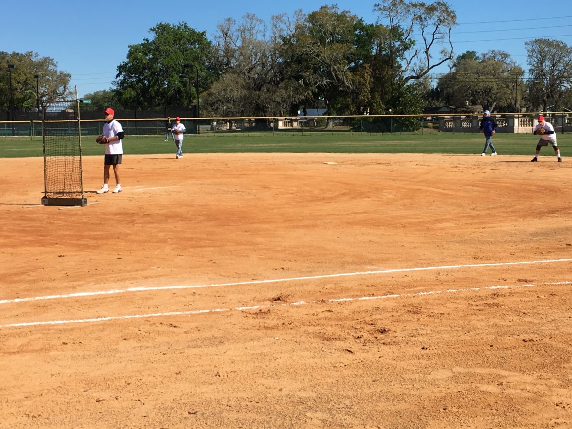 residents playing softball at leland games