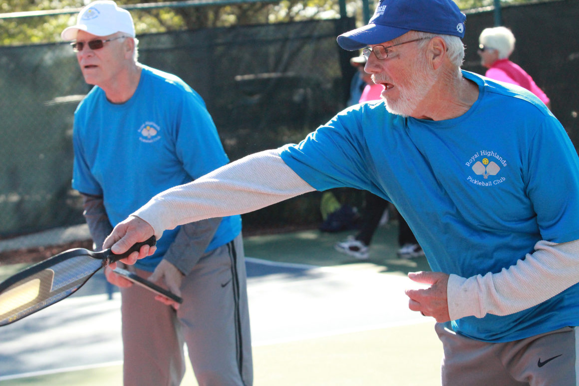 elderly men playing pickleball at the leland games 2018